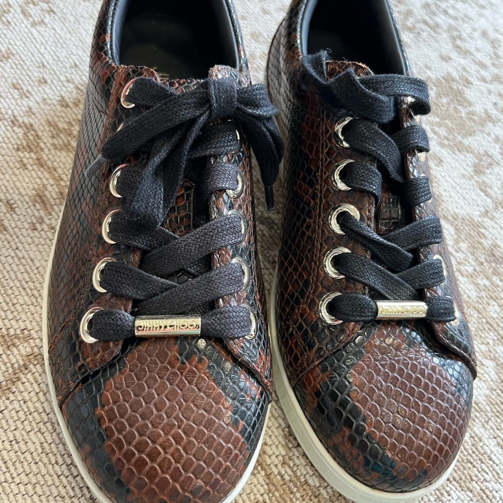 Jimmy Choo snakeskin-like leather sneakers
Brown…hot colour this year’